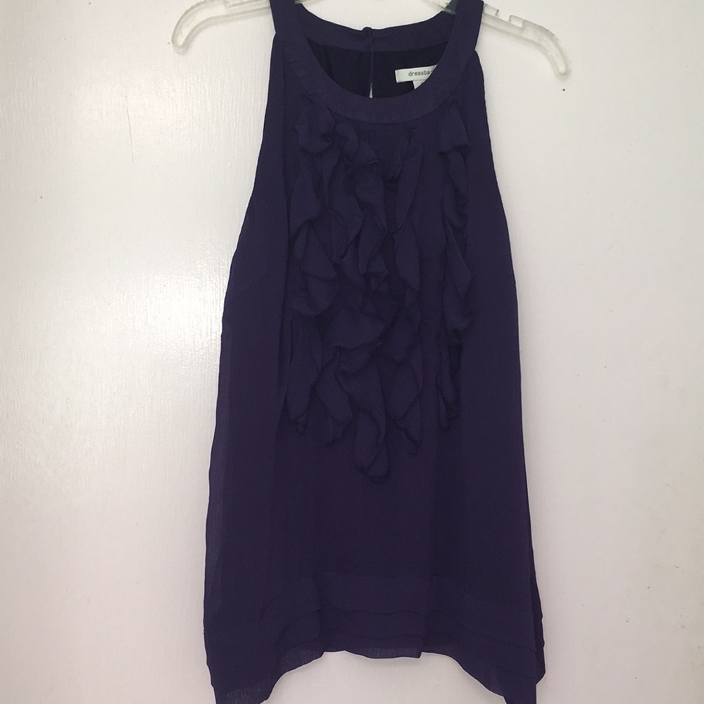 A dark purple ruffled tank